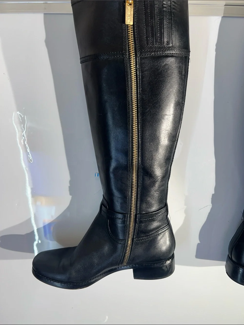 Knee-high leather boots with MK logo